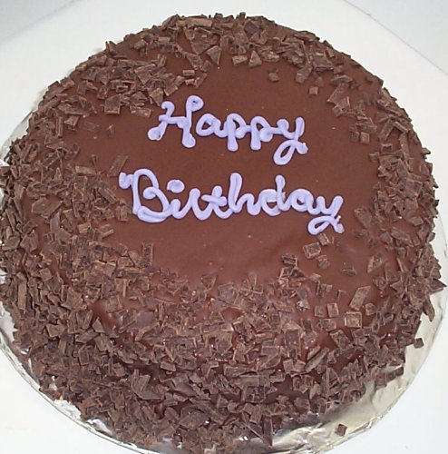 Vanilla-Cherry-Chocolate Lovers Cake Topped with White Chocolate and Dark Chocolate Flakes