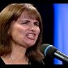 Susan Bailey sings the prayers of the Holy Rosary.