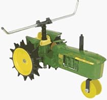 John Deere 4010J Traveling Sprinkler Green
