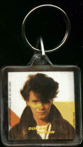 Click here to buy Duran Duran - Andy Taylor Lucite Keychain - Authentic 1980's Collectable!.