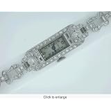 Ladies Platinum Bulova watch 64 Diamonds. laniard strap by Bulova