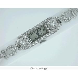Ladies Platinum Bulova watch 64 Diamonds. laniard strap