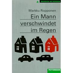 Ein Mann verschwindet im Regen