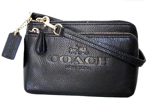 two coach wristlets