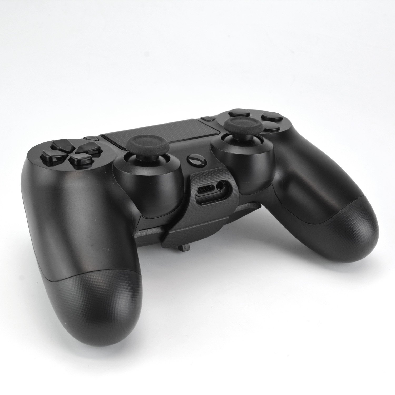 Details and images for Game Tech's DualShock 4 battery addon accessory