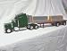 Peterbilt Spread Axle Flatbed w/ Jersey Barriers Image