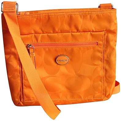 coach wallets tangerine