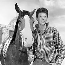 Ricky Nelson - Singer and actor Ricky Nelson with a horse