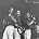The Kingston Trio - The Kingston Trio performing on stage.