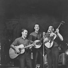 The Kingston Trio - The Kingston Trio performing on stage.