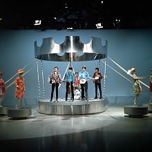The Hollies - 1968. Liverpool pop band "The Hollies" on a TV set playing live, next to four mannequins.