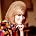 Dusty Springfield - 1965. A facial portrait of the famous British singer Dusty Springfield sitting at home smiling at the camera.