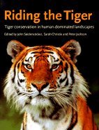 Riding the Tiger: Tiger Conservation in Human-Dominated Landscapes by John Seidensticker