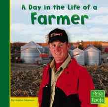 A Day in the Life of a Farmer (First Facts: Community Helpers at Work)