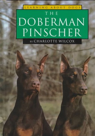 The Doberman Pinscher (Learning about Dogs) by Charlotte Wilcox