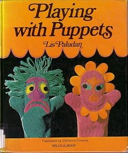Playing with puppets by Lis Paludan