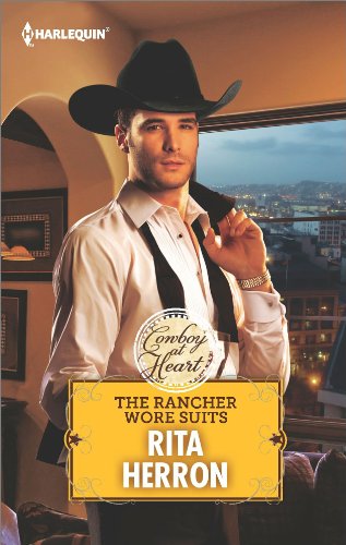 The Rancher Wore Suits by Rita Herron