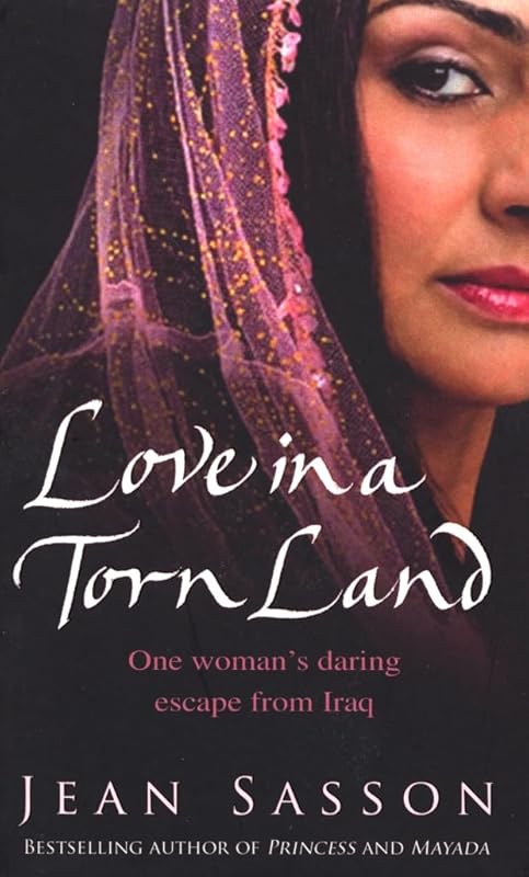 LOVE IN A TORN LAND [A] by Jean P Sasson