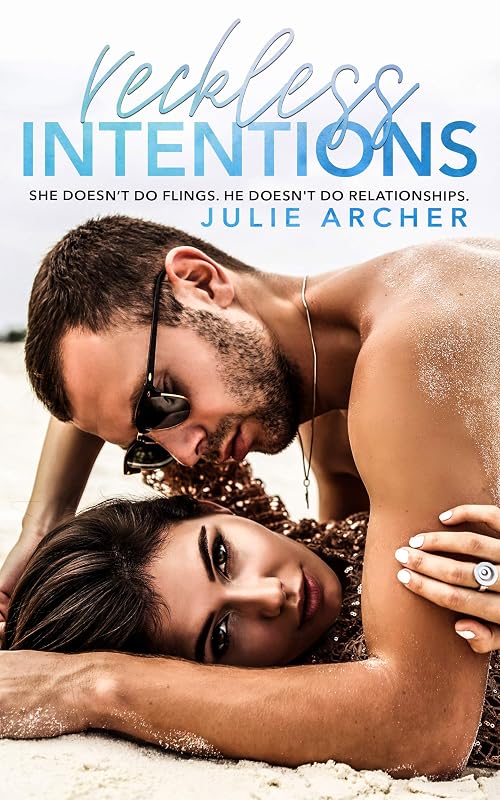 Reckless Intentions: An enemies to lovers, holiday fling romance by Julie Archer