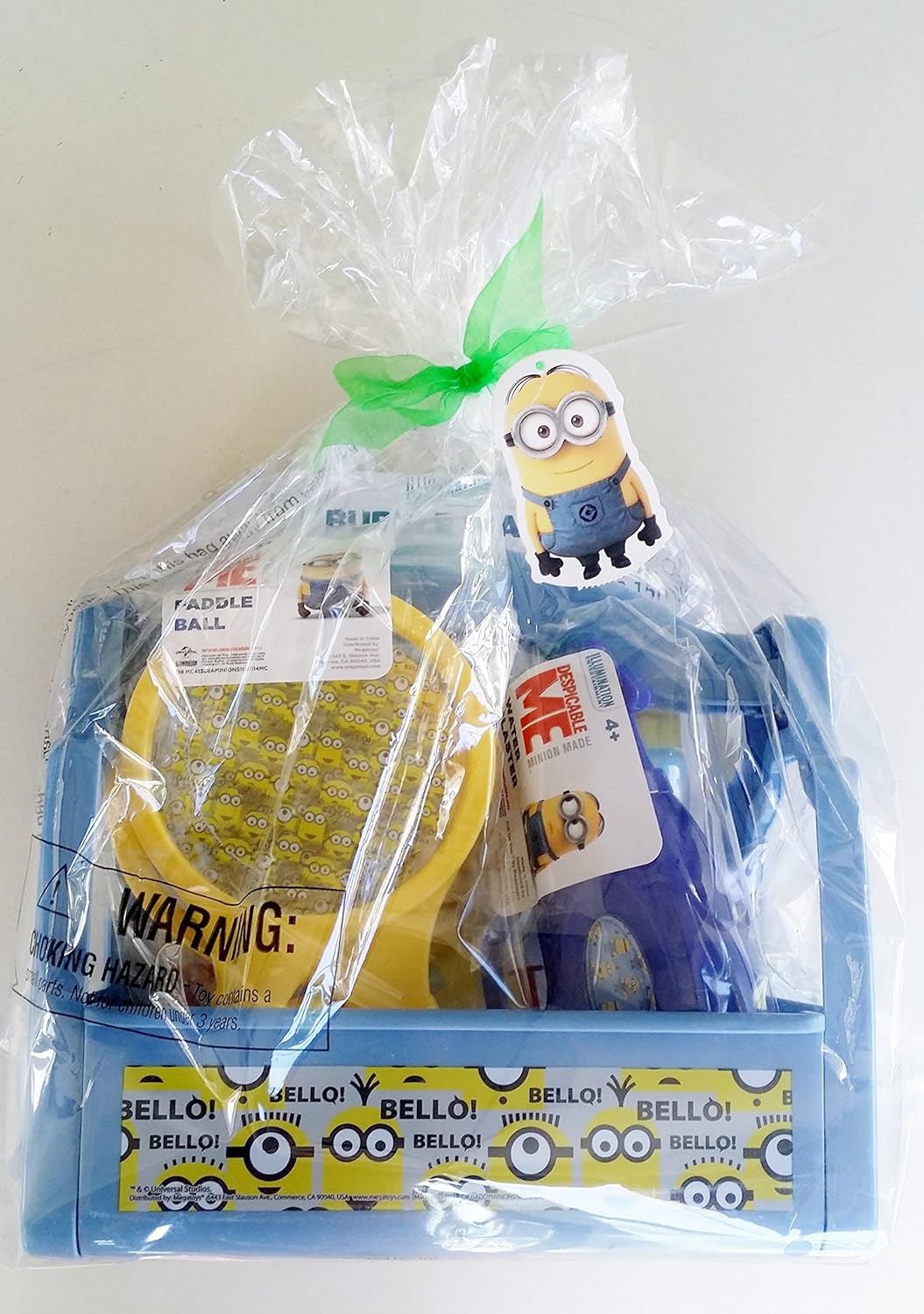 

Despicable Me Caddy 4 Piece Gift Set Minion Made - Water Gun, Paddle Ball Set, Bubble Wand with Solution all in a Fun Minion Container!