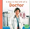 A Day in the Life of a Doctor (First Facts: Community Helpers at Work)