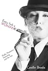 Every inch a woman: phallic possession, femininity, and the text