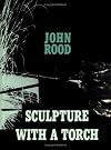 Sculpture with a torch