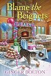 Blame the Beignets (A Deputy Donut Mystery)